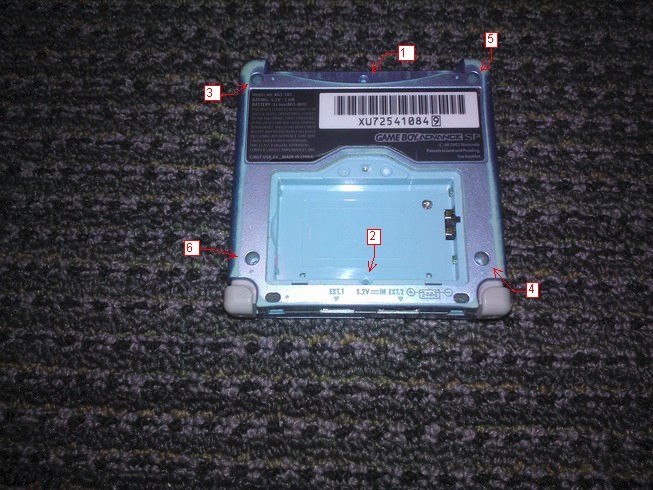 With the cartridge port facing away from you, first replace the top
				middle screw, then the bottom middle, top left, bottom right, top right, and finally bottom left